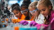 © Exsinghas - Young girls engaged in STEM activity, wearing safety goggles and gloves, focused on experiments in laboratory setting. Their expressions show curiosity and determination