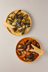 Wall Mural - Artistic Mussels in Cream and Tom Yum Sauce Dual Palette Culinary Delight