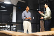 © Wavebreak Media - Holding drinks, diverse professionals networking and engaging in conversation at office event