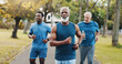 © KayExam/peopleimages.com - Group, men and running in outdoor fitness for mobility training, exercise and morning routine. Elderly, people and coach for challenge, workout support and cardio performance of wellness goal at park