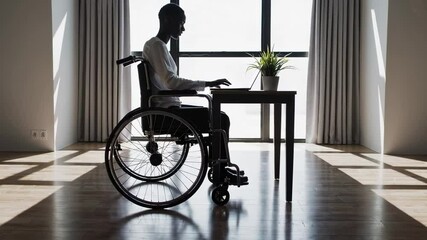 Aufkleber - Office worker using laptop at desk, demonstrating workplace accessibility and inclusion for people with disabilities in a modern, bright office environment, captured in slow motion