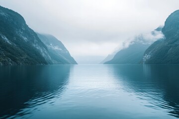 Fototapete - Misty fjord landscape showcasing serene waters and towering mountains in a tranquil, overcast setting. Generative AI