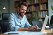 © Vadym - Successful bearded businessman works with laptop in office. Smiling man satisfied with work results, achievements types on keyboard. Person inside office paperwork with documents, accounts. Happy
