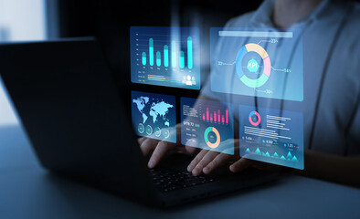 Wall Mural - Businessman using KPI dashboard.Financial business data analytics graph dashboard. Management data System KPI connected in database for follow earnings,operations and sales data.	