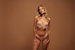 © Beauty Hero - Studio photo of slender stunning woman underwear enjoying self acceptance look mockup isolated beige color background