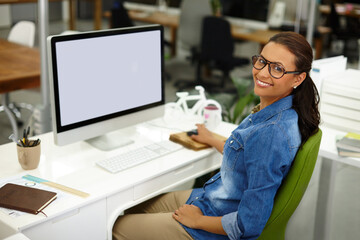 Leinwandbilder - Blank space, computer screen and portrait of woman in office for startup business review online. Confident, technology and customer experience manager with mockup for positive feedback on company