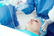 © peopleimages.com - Woman, patient and oxygen mask in surgery for anaesthesia safety, emergency procedure and air. People, surgeon and gas machine for sleeping, operation gear and medical treatment of healthcare service