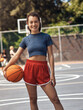© peopleimages.com - Woman, sports and basketball portrait on court, player and ready for outdoor competition. Athlete, recreation centre and person for fitness in community, practice skills and confidence with exercise
