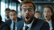 © HISTOCK - Business people having shocking reaction looking at something astonishing