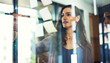 © peopleimages.com - Business woman, writing or meeting with glass board for project planning, tasks or team agenda at office. Female person, delegation planner or employees for schedule, ideas or company vision together