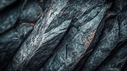 Canvas Print - Close-up of dark, textured rock formations. Deep shadows and contrasting light highlight the intricate details.