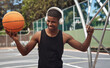© peopleimages.com - Basketball, player and music with ball on court for match practice, workout audio and fitness training. African person, sports athlete and headphones for game performance, radio and exercise playlist