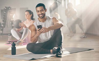 Aufkleber - Fitness, phone and relax with man in gym to update app, social media or progress tracker. Break, exercise and smile with athlete person typing text message on floor of health club for recovery