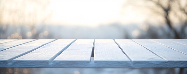 Aufkleber - Empty wooden table with winter forest background at sunset