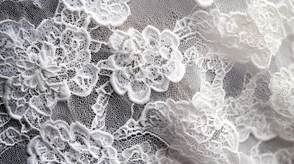 White lace fabric pattern with floral designs and elegant texture