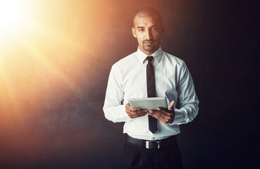 Poster - Portrait, studio and businessman with tablet for finance news and budget planning on dark background space. Research, lens flare and financial advisor on tech for schedule, report and accounting app