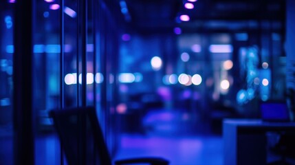 Poster - Blurred view of a modern office at night, illuminated with blue and purple lighting.