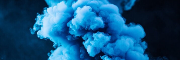 Poster - Abstract Blue Smoke Cloud - Vivid blue smoke billows against a dark background, creating a dramatic and ethereal effect. Perfect for design projects needing a touch of mystery