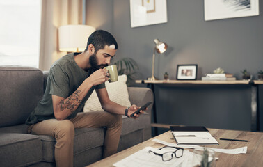 Aufkleber - Relax, phone and man on sofa with coffee for social media, online post and internet in home. Apartment, weekend and person with drink on smartphone for reading ebook, website news and connection