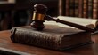 © MdArshed - Law theme, mallet of judge, wooden gavel on old book