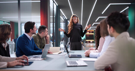 Poster - Manager leading interactive workshop for diverse group of professionals