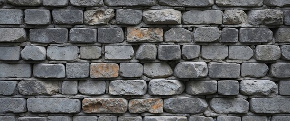 Poster - Gray brick wall texture with uneven surface and varied stone shapes arranged in horizontal pattern
