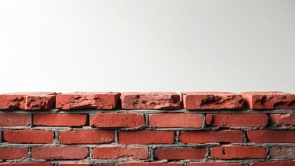 Poster - Red brick wall with mortar against a blank white background in a minimalistic interior setting