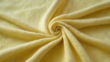 Poster - Yellow textile fabric close-up with spiral shape and soft texture suitable for fabric design and textile backgrounds