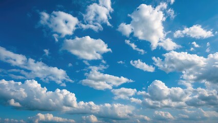 Poster - Blue sky with scattered fluffy clouds during daytime minimalistic landscape background