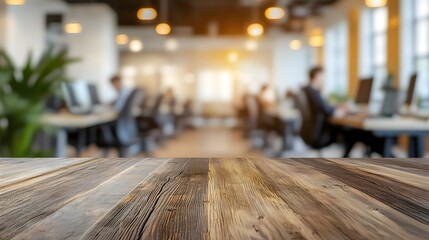 Poster - Blurred office background with focused professionals working on computers at their desks in a modern productive work environment  Concept of corporate business teamwork