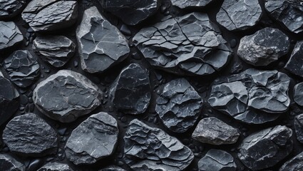 Poster - Textured background of dark gray slate stones with varied shapes and sizes arranged closely together.