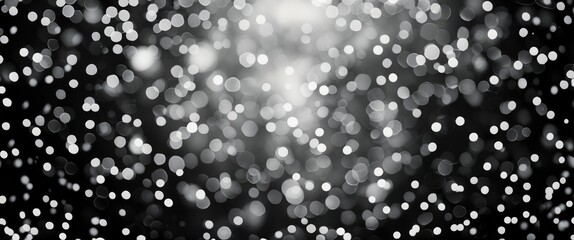 Poster - Elegant black and white bokeh background with soft light effects ideal for creating a dreamy atmosphere in photography or design projects
