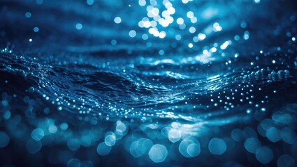 Poster - Close up of shimmering blue water surface with reflections and bokeh effect highlighting texture and movement of waves