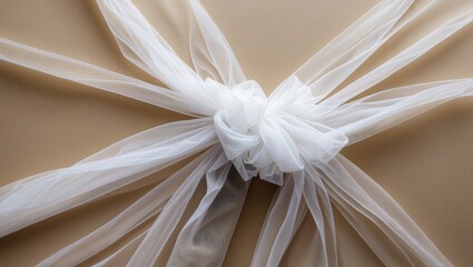 Poster - White tulle ribbon knot on beige background creating elegant fabric texture and design for crafts or decoration purposes