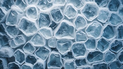 Poster - Close-up of frozen ice crystals forming geometric patterns on a surface with varying shades of blue and white textures