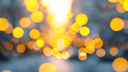 Poster - Blurred background with warm yellow and orange bokeh lights creating a glowing effect in a soft focus setting