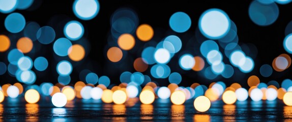 Poster - Colorful bokeh lights in blue and orange tones against a dark background creating an abstract festive atmosphere