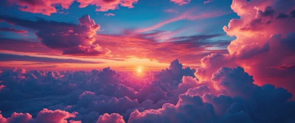 Wall Mural - colorful sunset over clouds with dramatic lighting and vibrant hues of orange, pink, and blue in the
