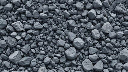 Poster - Textured gray gravel surface for industrial applications and backgrounds showcasing a mix of small and large stones. Perfect for design use.