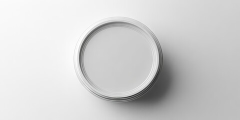 Aufkleber - Minimalist white circular plate against a bright white background casting a soft shadow, emphasizing simplicity and elegance in dining decor.