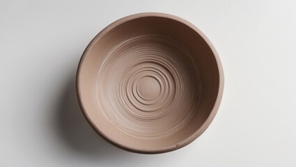 Aufkleber - Empty round clay bowl viewed from above on a white background showcasing smooth, textured interior perfect for artistic or culinary themes