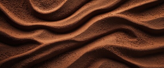 Poster - Chocolate brown desert sand natural texture with smooth waves and patterns creating an artistic background ideal for creative projects.