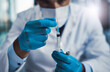 © Donson2000/peopleimages.com - Healthcare, science and hands of man with syringe, drug and research for antivenom in hospital. Face mask, needle and person with vial, medical innovation and venom protection for biotechnology