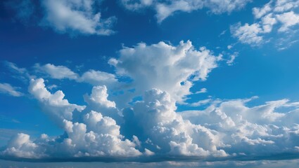 Wall Mural - dramatic cloud formations under a bright blue sky displaying vibrant and contrasting weather pattern