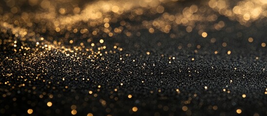 Fototapete - Elegant abstract background featuring a rich blend of black and gold shimmering textures, with scattered golden particles creating depth and sophistication.