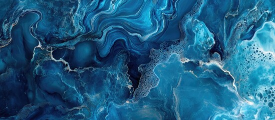 Fototapete - Serene abstract artwork showcasing intricate blue lagoon textures with swirling patterns and varied shades of deep and light blue tones throughout the composition.