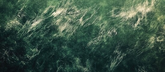 Fototapete - Textured green chalkboard background with subtle white chalk marks creating an abstract pattern ideal for educational themes or dark wall design.