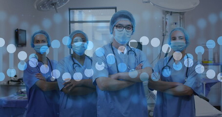 Poster - Image of dna strand over diverse doctors with face masks