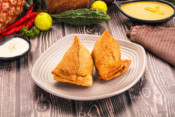 Wall Mural - Indian cuisine - stuffed samosa pastrie