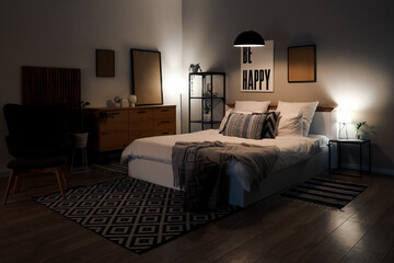 Wall Mural - Stylish interior of bedroom late in evening